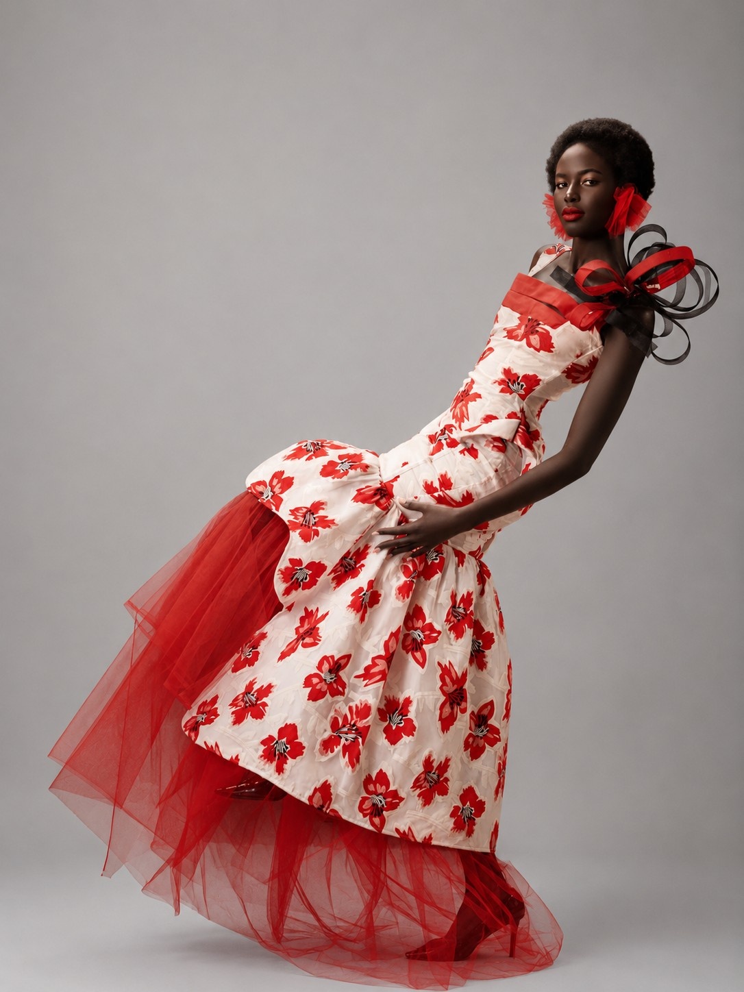 Model wearing Crimson Bloom in a posed studio portrait
